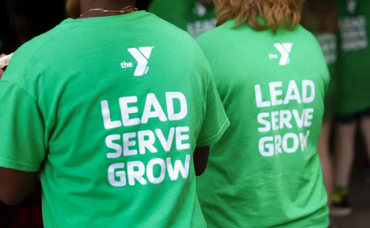 Group of teens sitting together outside