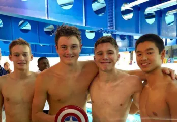 Four swimmers from YMCA swim team