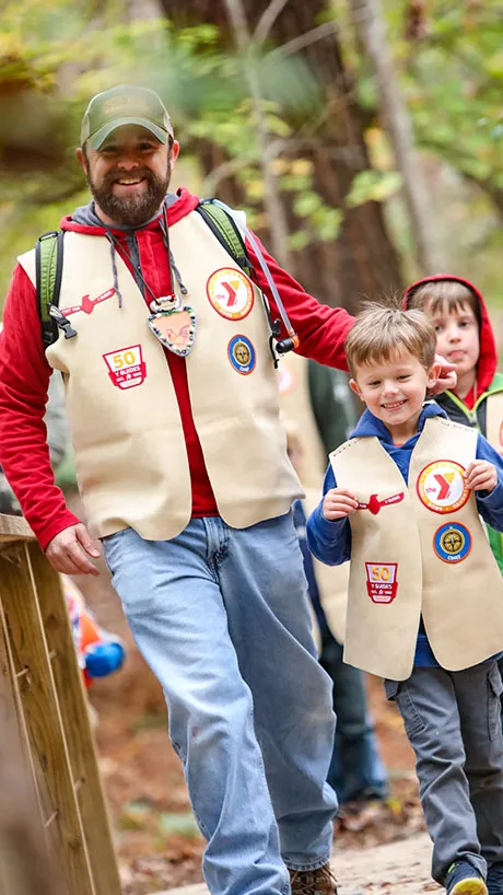 Y guides dad and son at fall outing