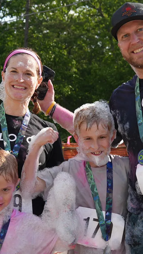 Family celebrating their finish at the Families On! race