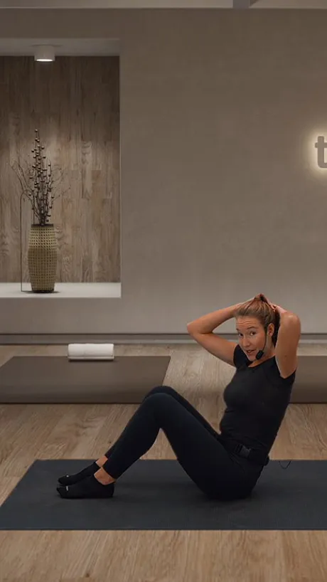 on-demand video of a woman teaching Pilates