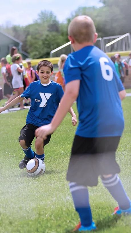 Kids participating in a soccer game