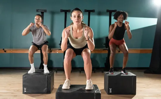 Three members in a conditioning class