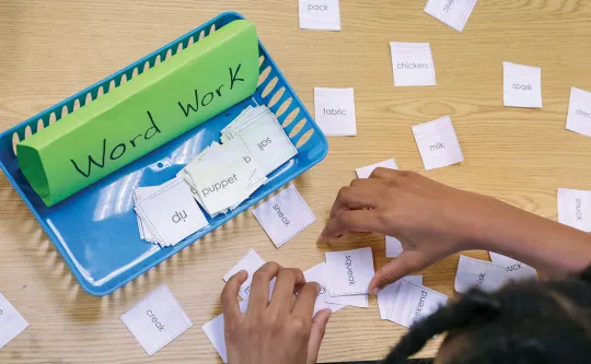 Child playing a reading skills game