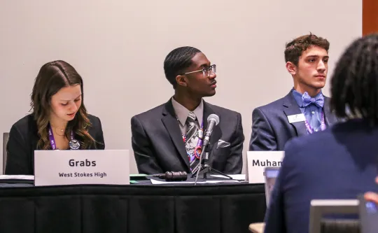 Youth and Government participants speaking at conference