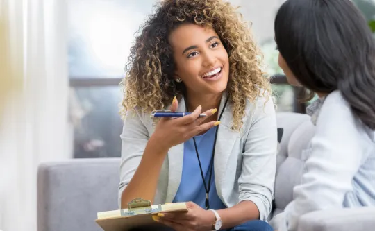 Two friends sharing a story