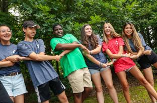group of teens celebrating together