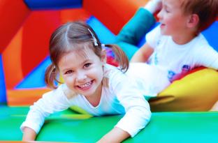 Kids enjoying a bounce house