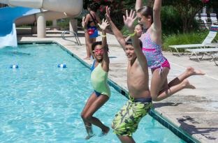 Kids jumping in the Meadowmont pool