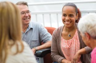group of adults talking in a group