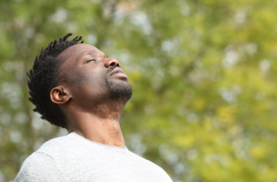 black male meditating