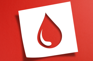 paper cutout of a drop of blood 