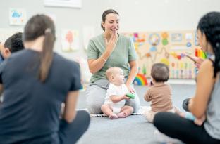 mom and baby learning sign language together 