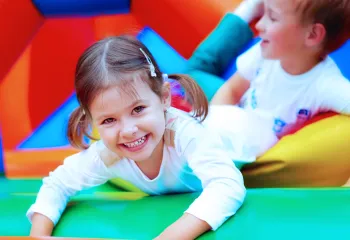 Kids enjoying a bounce house