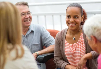 group of adults talking in a group