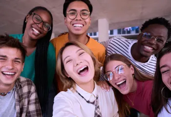 Group of adult teens taking a selfie