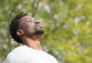 black male meditating