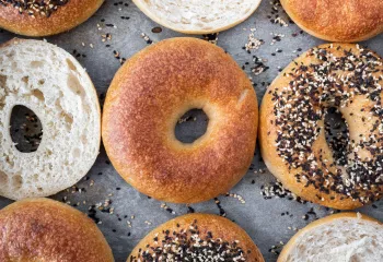 assortment of bagels on a parchment paper sheet