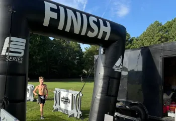 Finley Frenzy Youth Triathlon participant finishes the 2025 race