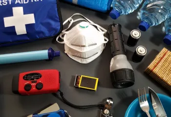 Assortment of first responder essentials laid out on a table