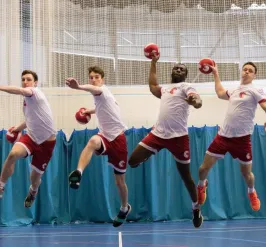 dodgeball participants mid air