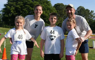 Family celebrating their finish at the Families On! race