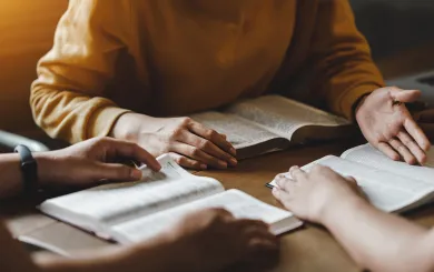 women reading the bible together