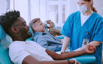 Man preparing to donate blood