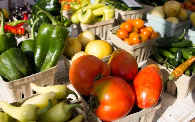 grouping of fresh farm vegetables on a display