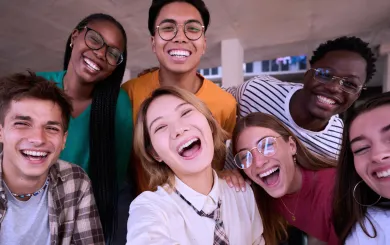 Group of adult teens taking a selfie