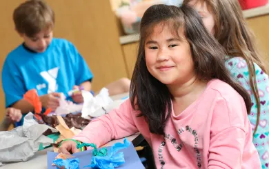 Girl with her art project