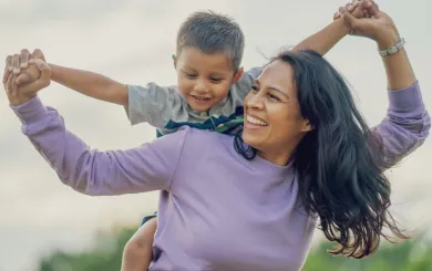 Smiling family portrait outside