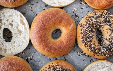 assortment of bagels on a parchment paper sheet