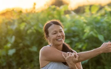 sunrise stretching woman sitting down 