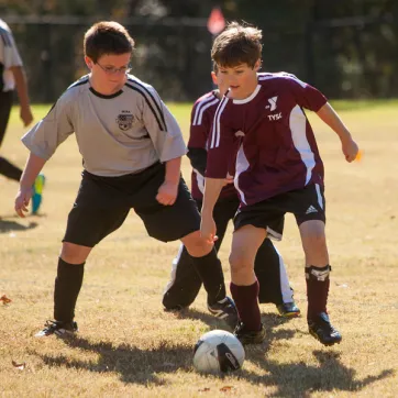 Boys playing soccer