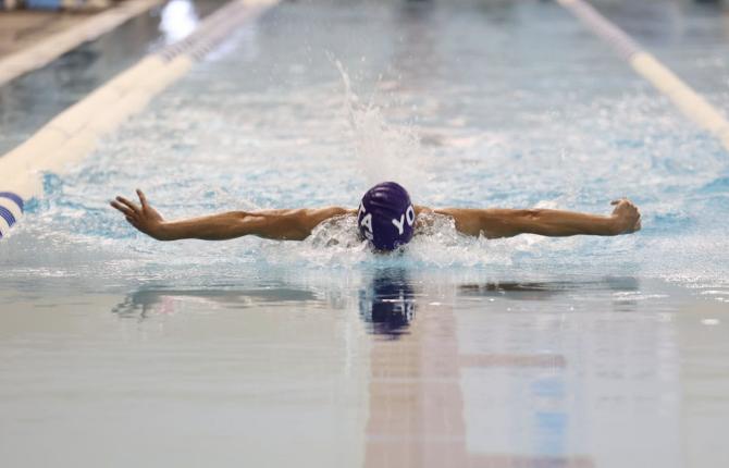 YOTA swimmer competing in the pool