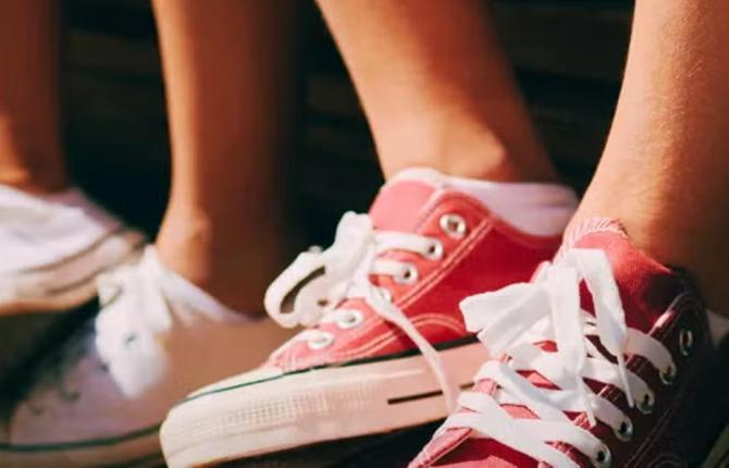 two pairs of low top converse